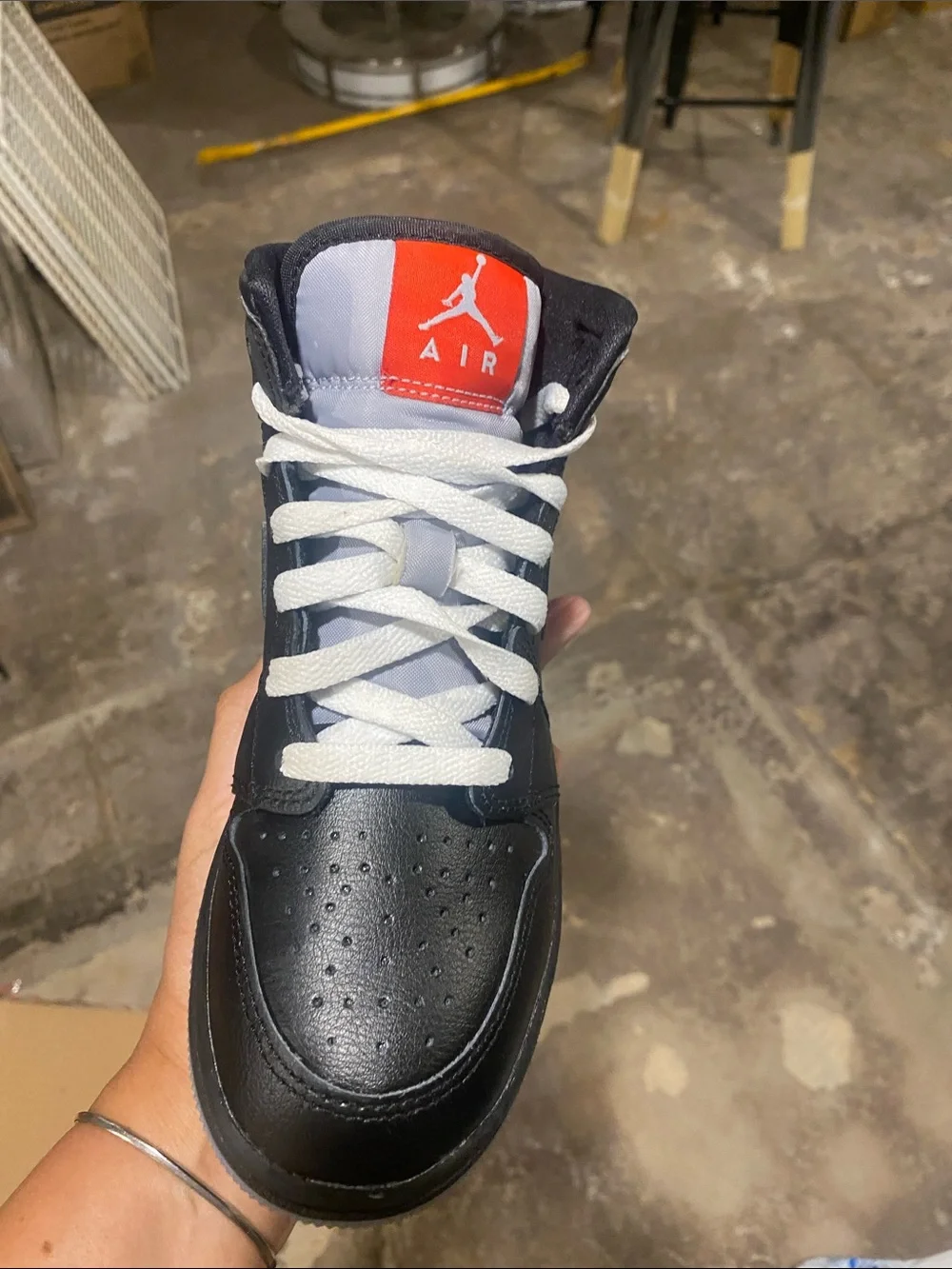 Nike Air Jordan 1 Mid - Black with White Laces and Red Tongue